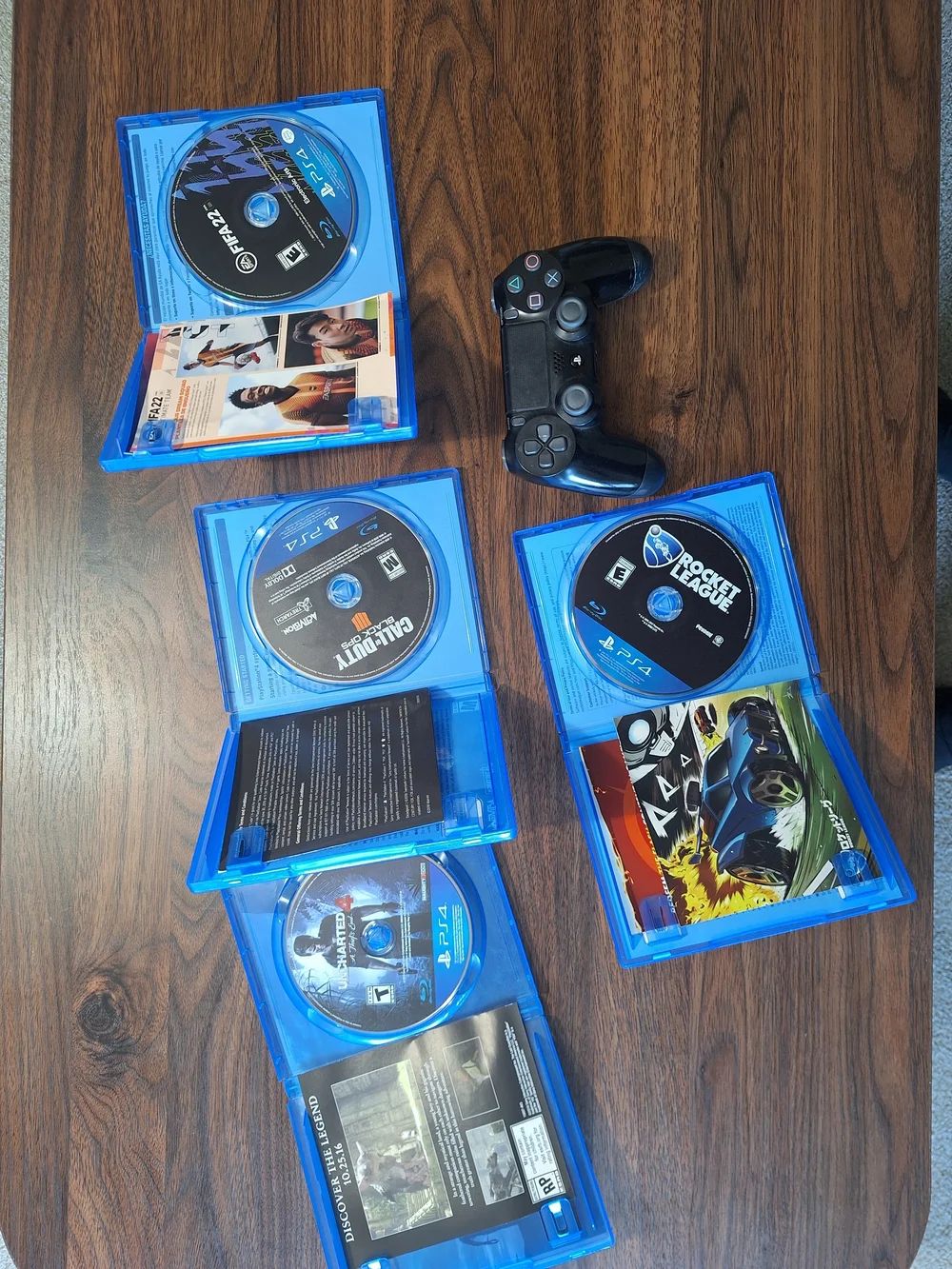 Sony PS4 Controller with Black Finish and Blue Game Cases Bundle